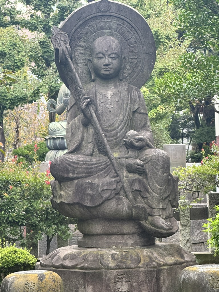 morning wandering through the temples of taito led christina to this peaceful jizo statue, one of HUNDREDS watching over the neighborhood