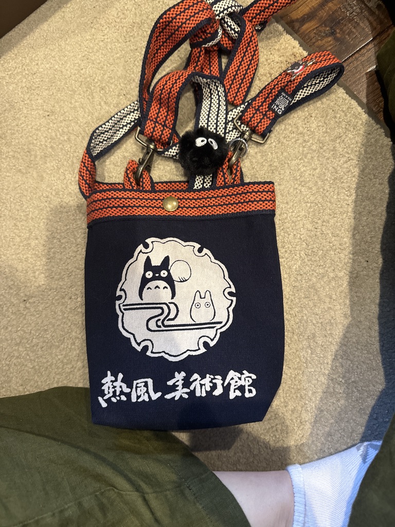 scored this sweet totoro bag at the ghibli museum shop. the little soot sprite charm was a bonus