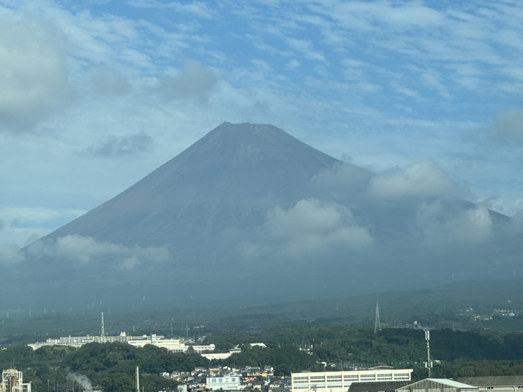 quick shot of mt. FUJI from the shinkansen window as we zoomed between tokyo and osaka. christina managed to catch it between the clouds.