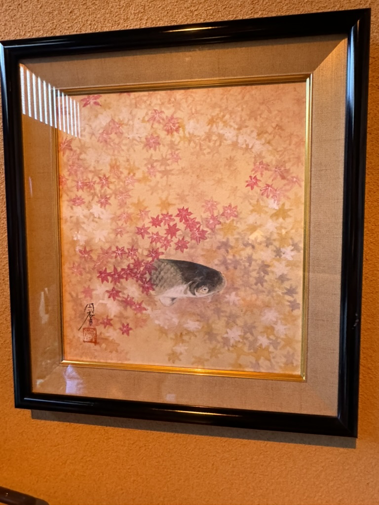 beautiful japanese artwork hanging in our osaka rental - christina found this delicate painting of a koi fish among maple leaves in the traditional house we're staying at