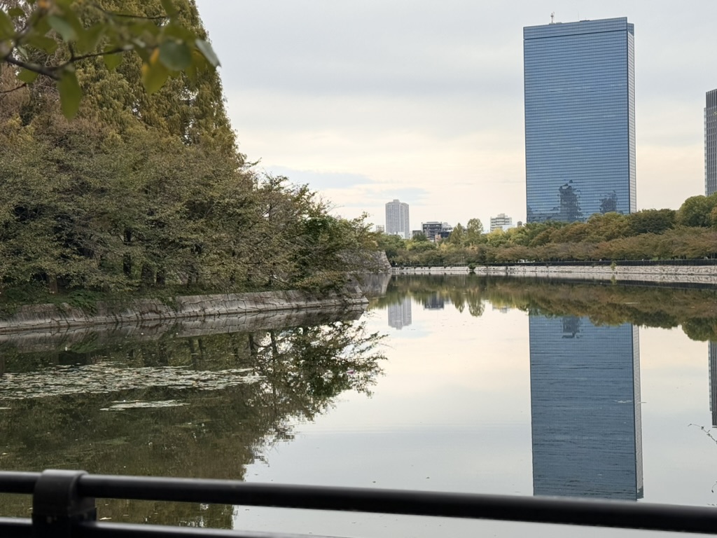 early morning walk around osaka castle's moat with the PERFECT mirror reflection of the osaka business park towers