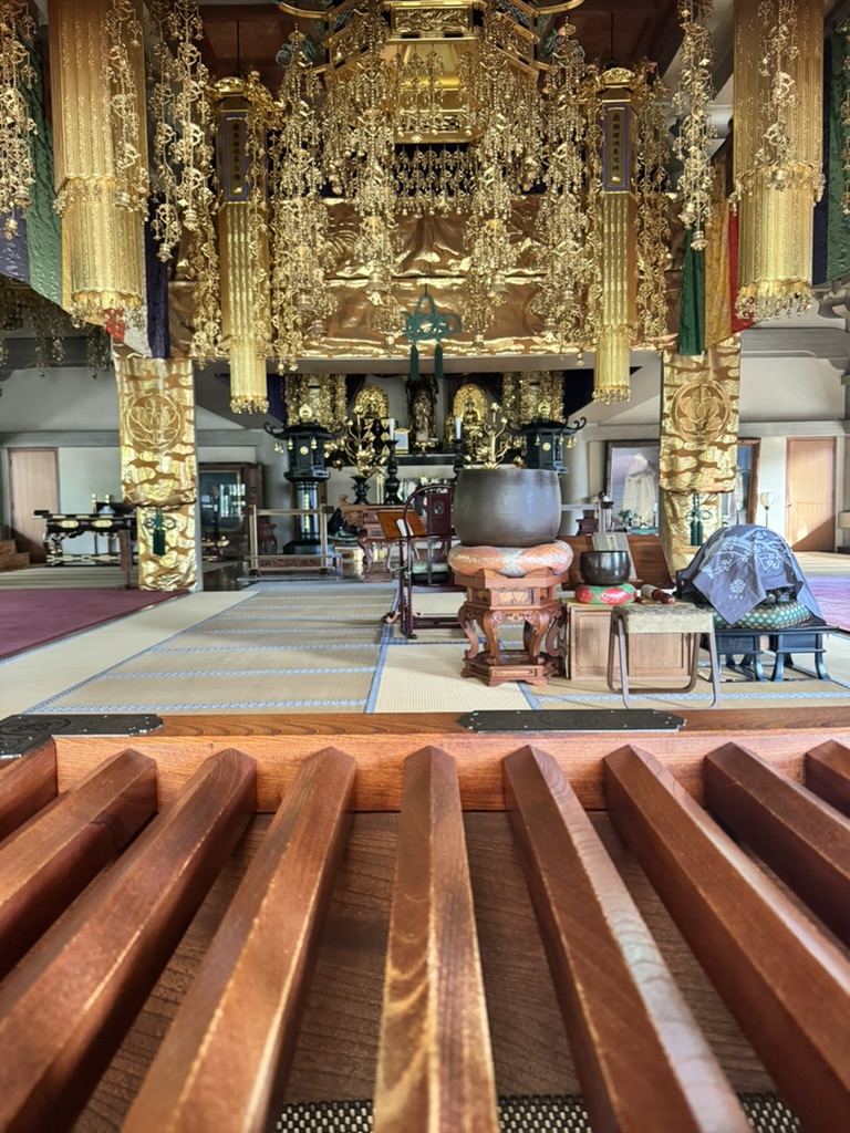 christina caught this view inside gotokuji temple - check out that WILD golden altar setup with all the hanging decorations