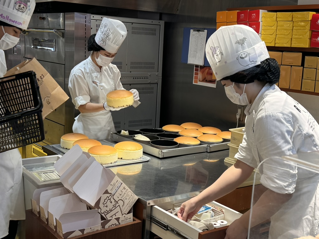 behind the scenes at rikuro ojisan's famous cheesecake shop in osaka - these fluffy japanese cheesecakes are LEGENDARY in the namba district