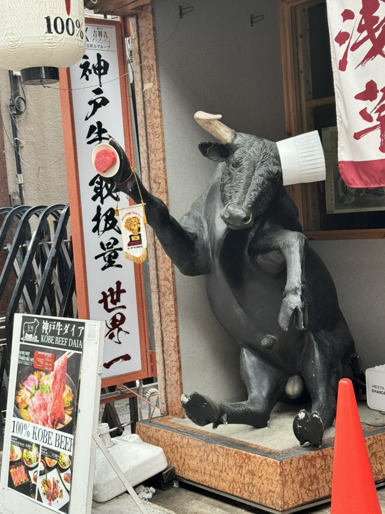 spotted this HILARIOUS kobe beef restaurant mascot near sensō-ji temple - the chef's hat really makes it