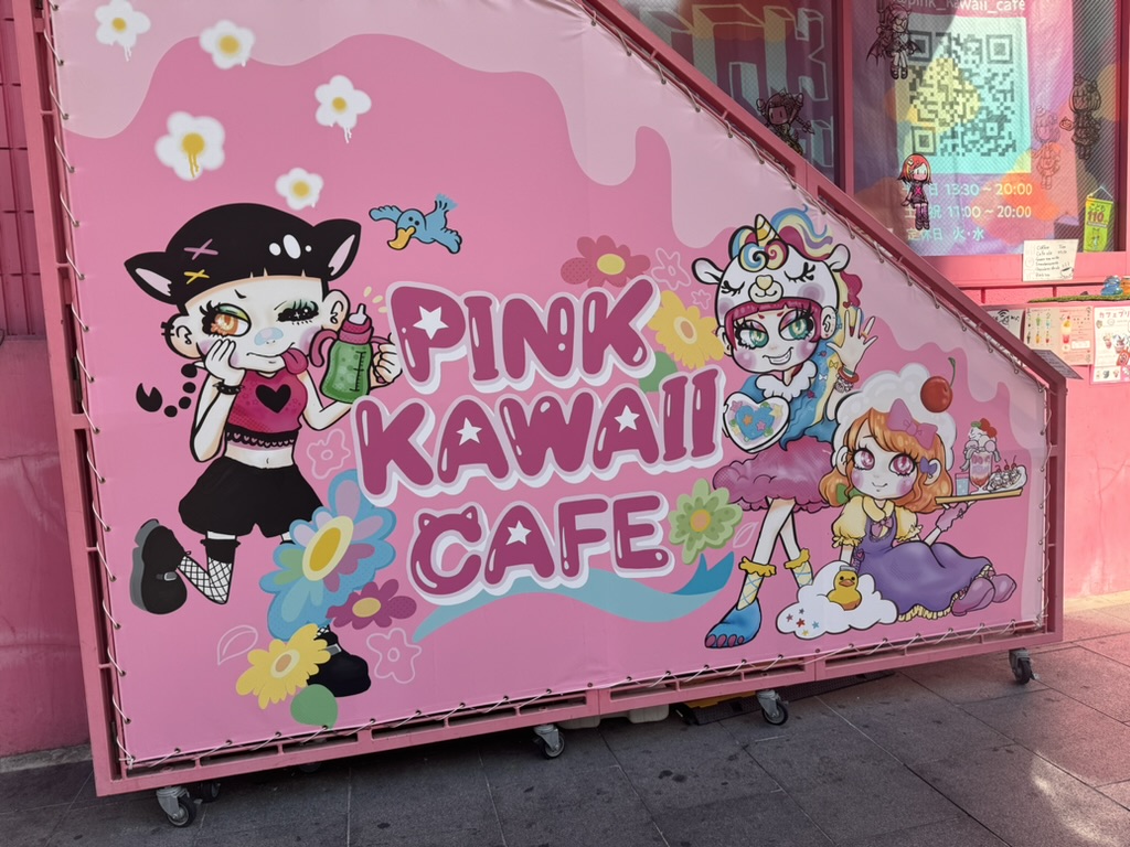 spotted this EXTREMELY pink cafe while wandering through dotonbori with daniel - had to grab a pic of peak osaka kawaii culture