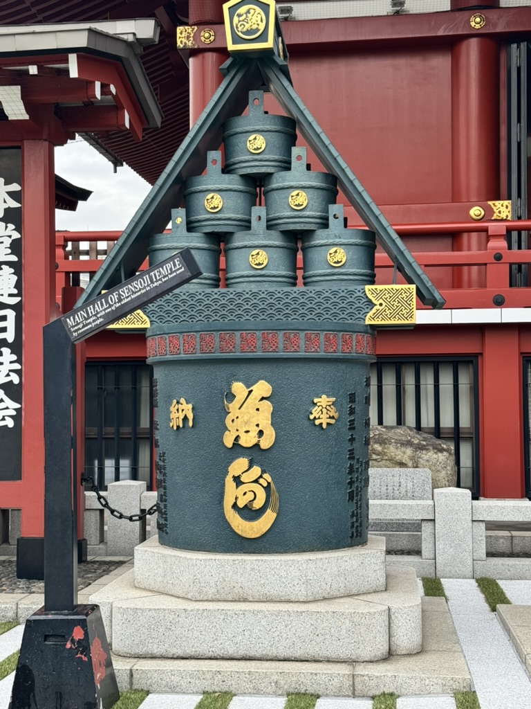 morning stop at the ICONIC sensoji temple in asakusa - check out this massive incense burner with its stack of bronze bowls