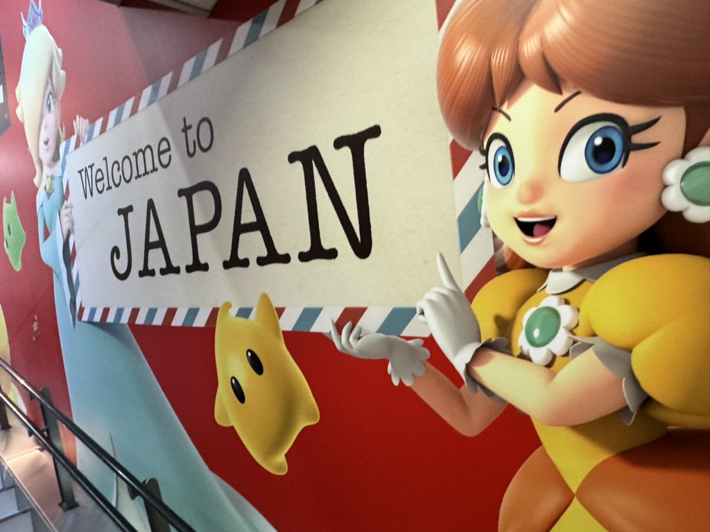 first glimpse of japan at narita airport - nintendo characters welcoming us with that classic japanese kawaii style