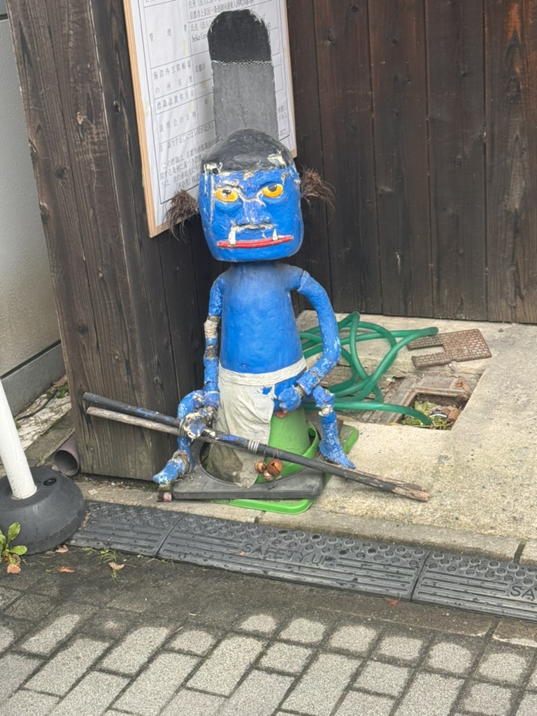 stumbled across this weird little oni guardian while wandering the backstreets near kamishichiken in kyoto. japan's quirky side never disappoints