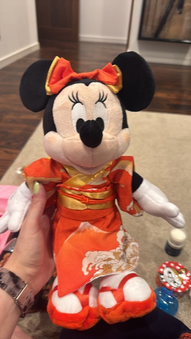 scored this limited edition minnie mouse plush in a traditional KIMONO at tokyo disneyland - christina couldn't resist the orange and gold design