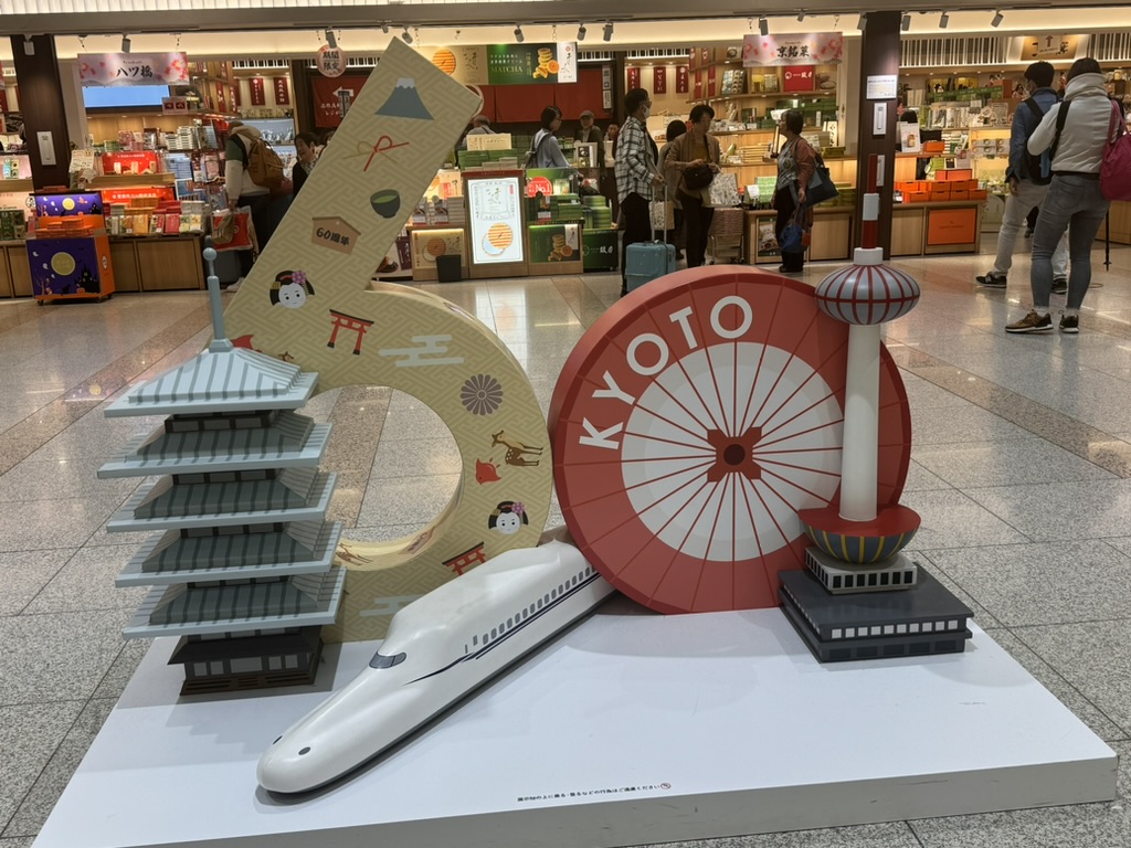 cool display at kyoto station showing off some of the city's ICONIC landmarks and the shinkansen that brought us here