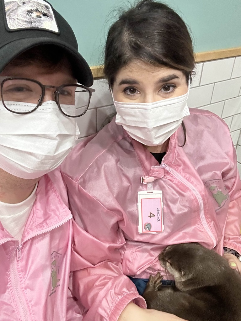 daniel and christina rocking matching pink jackets at the HARRY HEDGEHOG cafe in harajuku. when in japan, you gotta embrace the kawaii