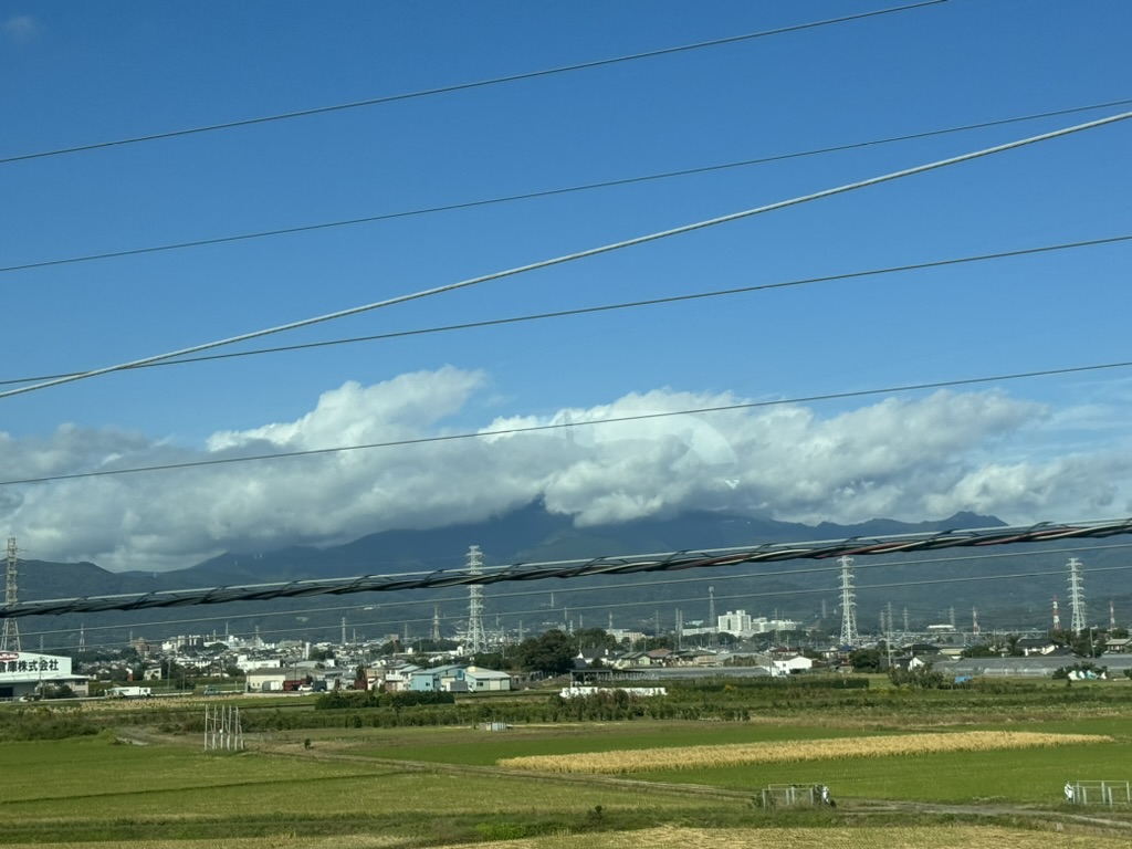 quick glimpse of mount oyama from the shinkansen window while zooming between tokyo and kyoto. those power lines are EVERYWHERE in japan.