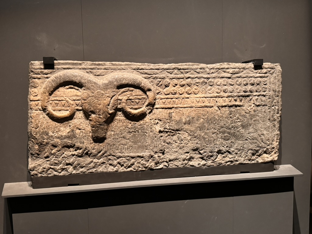 ancient stone carving at the tokyo national museum showing what looks like a ram or sheep motif. christina's getting into japanese art history.