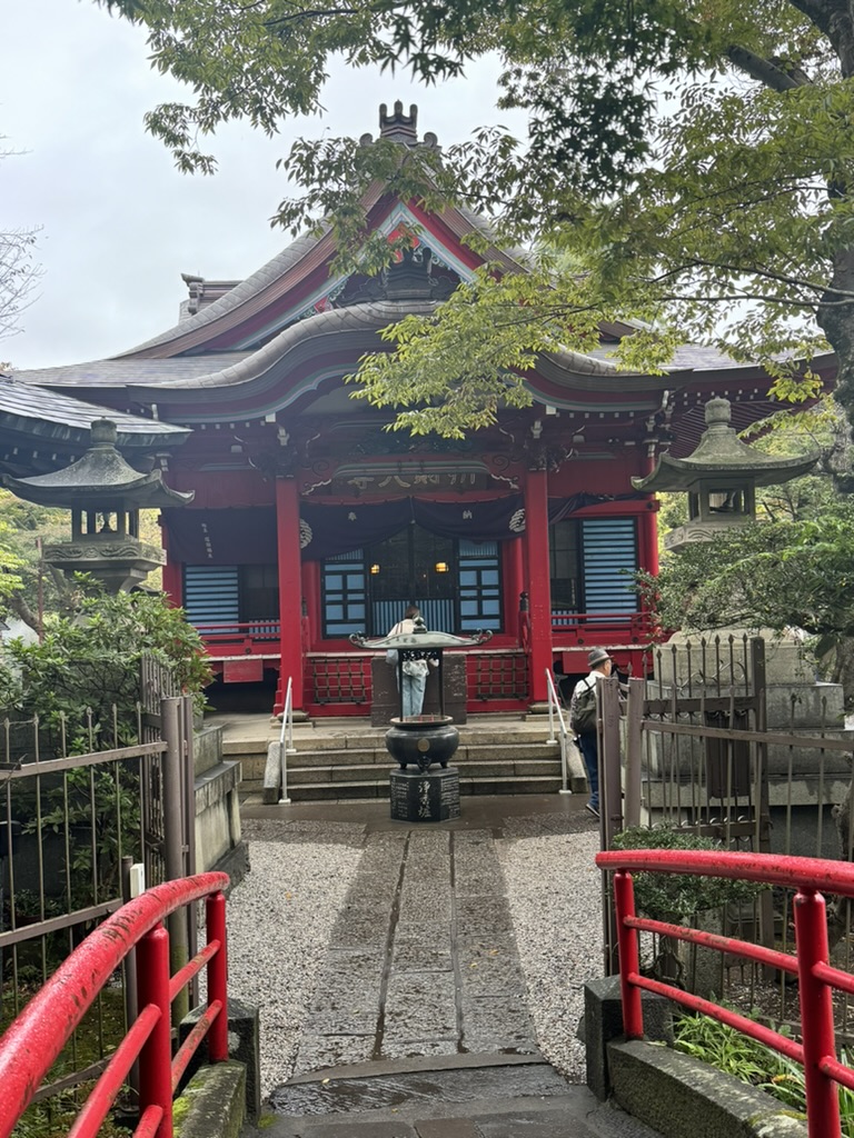 stumbled on this gorgeous shrine near the ghibli museum in mitaka. christina caught this shot while daniel checked out the incense burner.