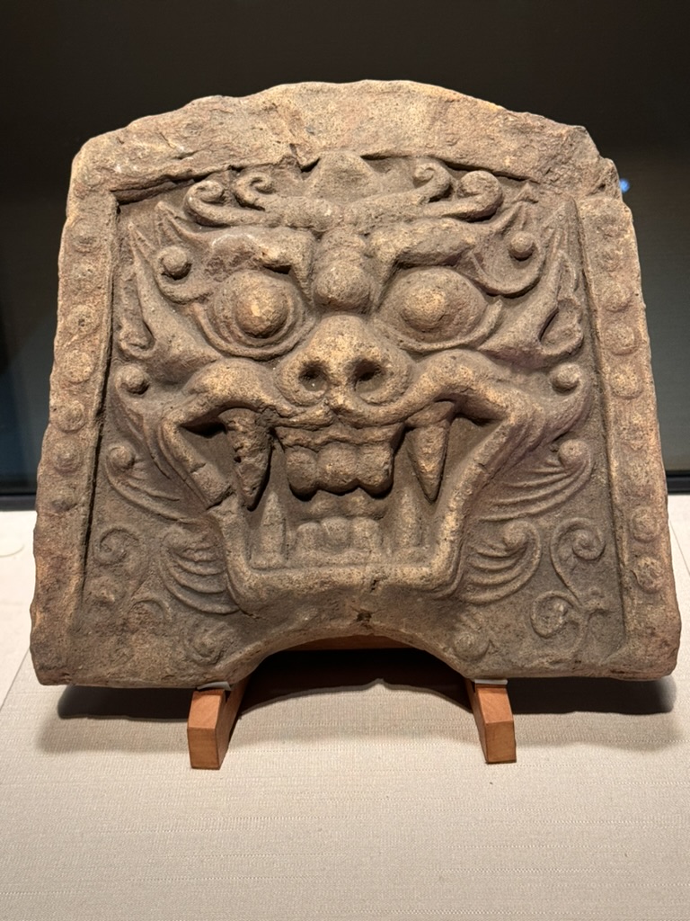 ancient onigawara roof tile at the tokyo national museum showing off some SERIOUS demon face energy