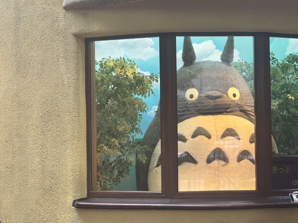 christina caught this MASSIVE totoro peeking through the window at the ghibli museum in mitaka. definitely worth the advance ticket booking hassle.