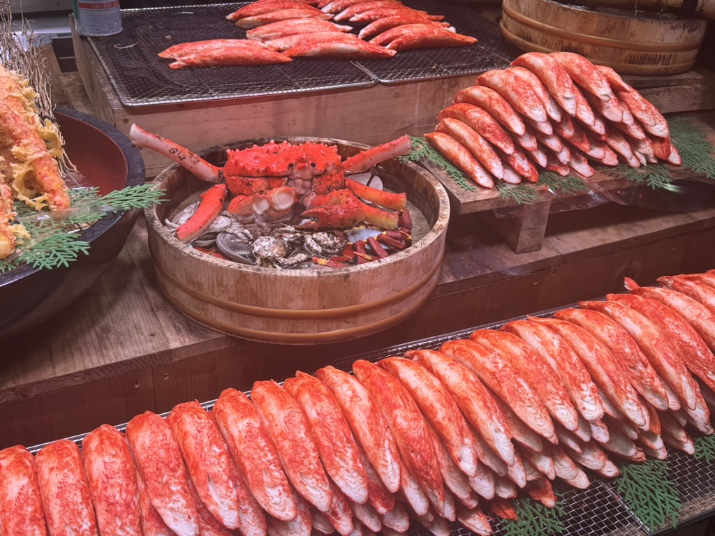 fresh seafood display at nishiki market in kyoto - those MASSIVE king crab legs though