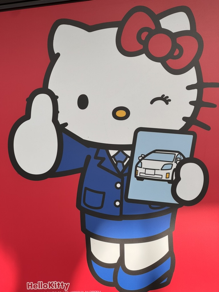 christina found this business-suited hello kitty at the osaka familymart near our teradacho airbnb - japan REALLY loves their mascots