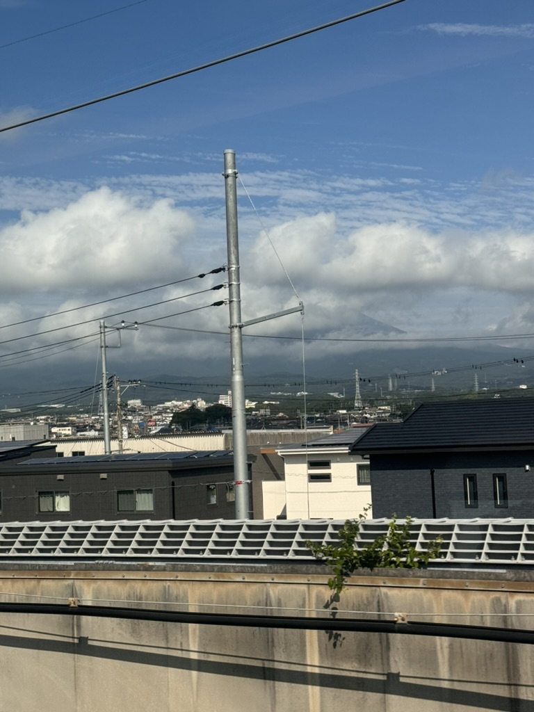 quick glimpse of mount FUJI peeking through the clouds during our shinkansen ride to kyoto. classic japan - even the power lines look organized.