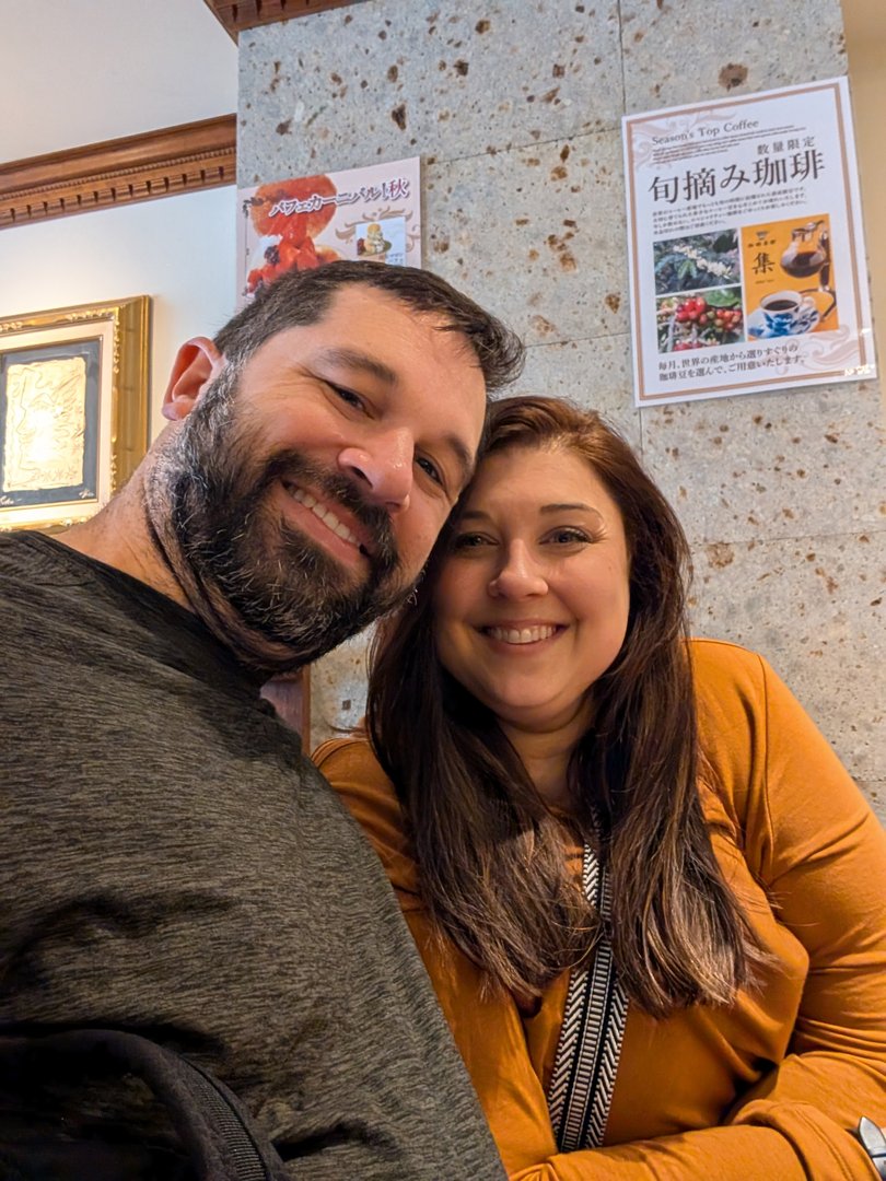 chuck and ashley taking a quick break at a japanese coffee shop in shinjuku. you can spot the traditional shunkaen coffee posters on the wall behind them.