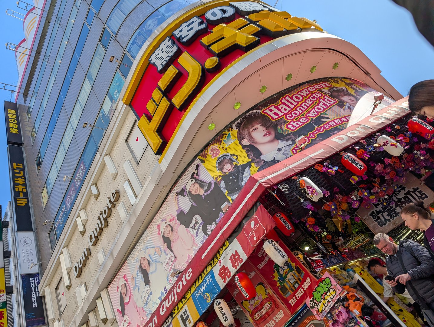 chuck and ashley checking out the sensory overload that is don quijote in shinjuku - these massive discount stores are open 24/7 and sell EVERYTHING