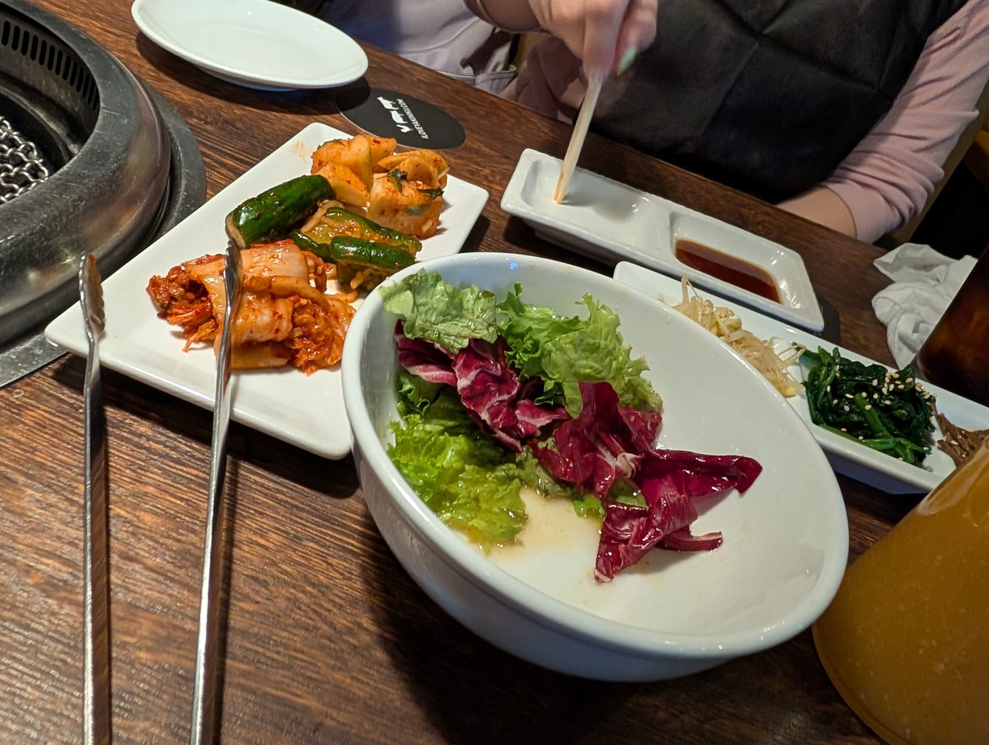 first korean bbq experience in shinjuku - chuck and ashley went all in on the banchan and kimchi