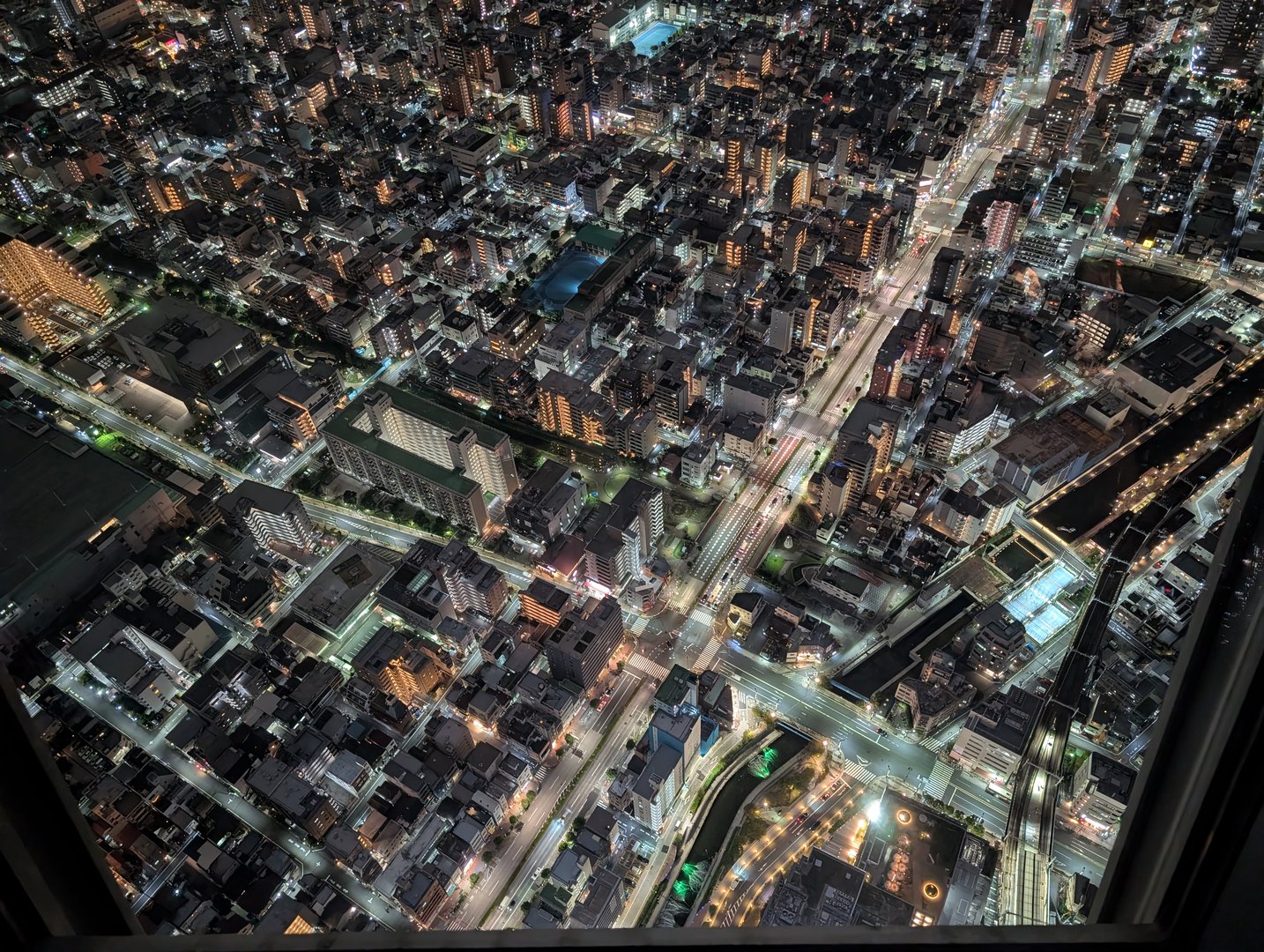 night view from the TOKYO SKYTREE showing sumida's dense urban landscape lit up like a circuit board. chuck's shot really shows how tokyo never sleeps.