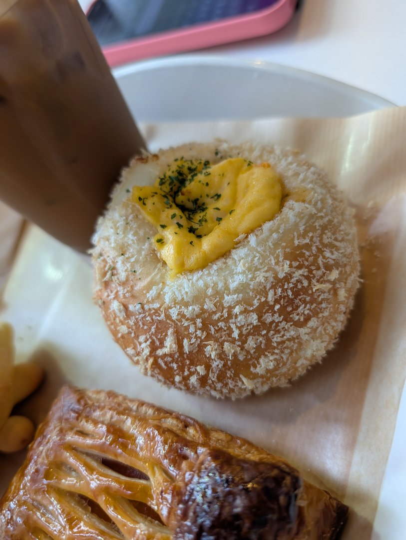 morning pastry run in shinjuku - chuck grabbed this AMAZING coconut cream bun from a tiny bakery near golden gai