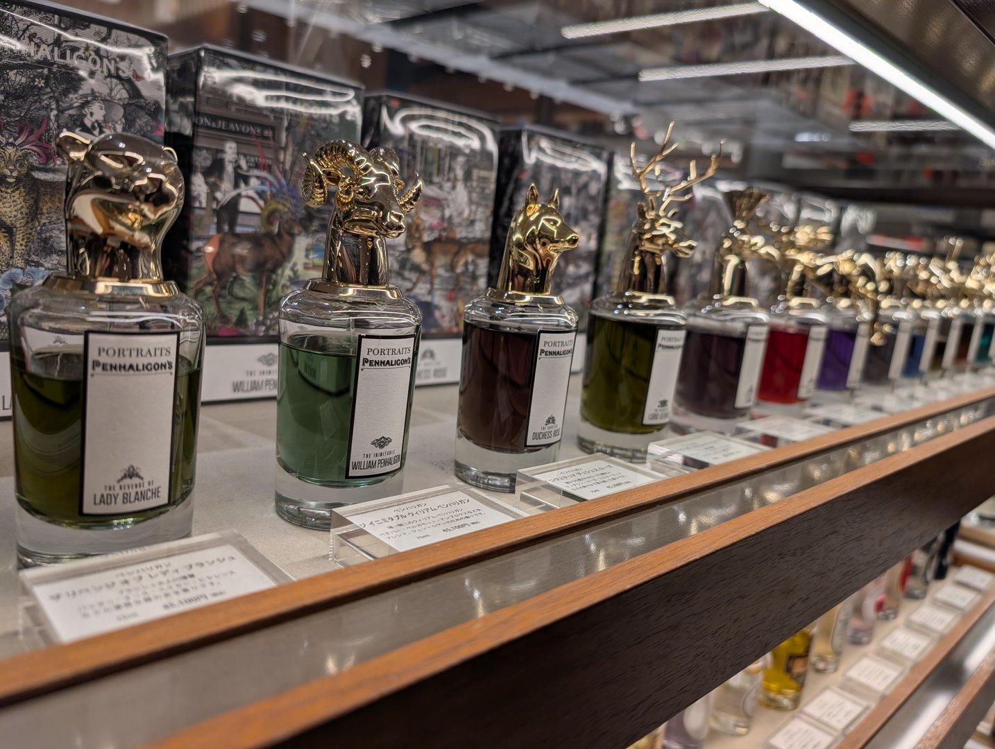 chuck found this FANCY perfume display at isetan shinjuku - those gold animal heads are way more extra than anything we've got at sephora back home