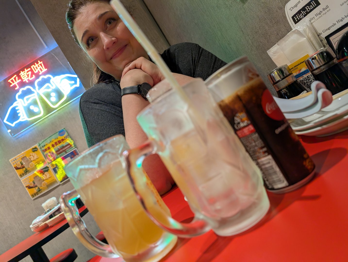 ashley taking a breather at this tiny shinjuku izakaya after a WILD day of exploring - those highballs hit different in japan