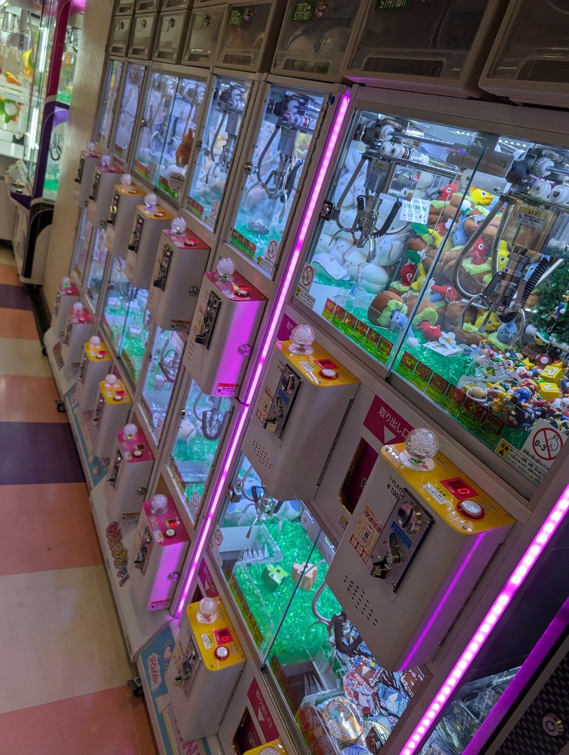 chuck found these INTENSE claw machines in a shinjuku arcade - way more serious than the ones back home