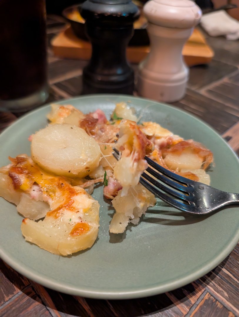 late dinner at this tiny izakaya in shibuya - chuck's first time trying REAL japanese potato salad and he's now obsessed