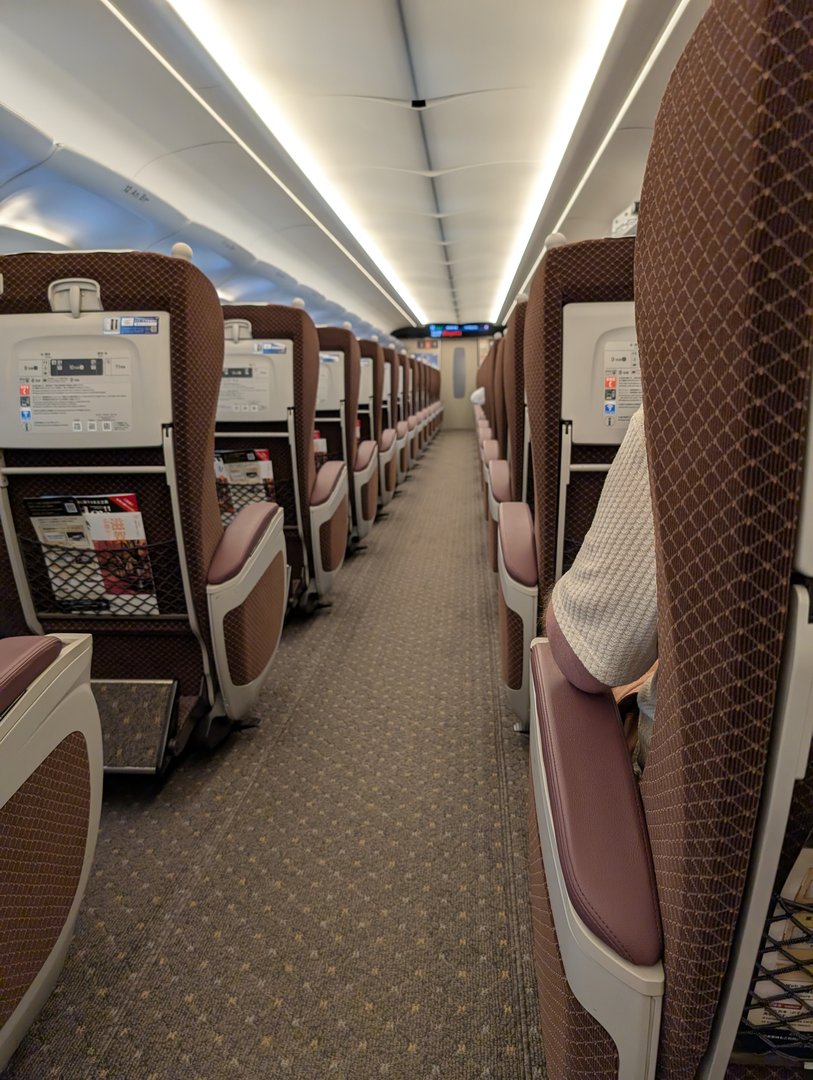 early morning shinkansen from tokyo looking SUSPICIOUSLY empty - chuck managed to snap this right before the morning rush packed it full