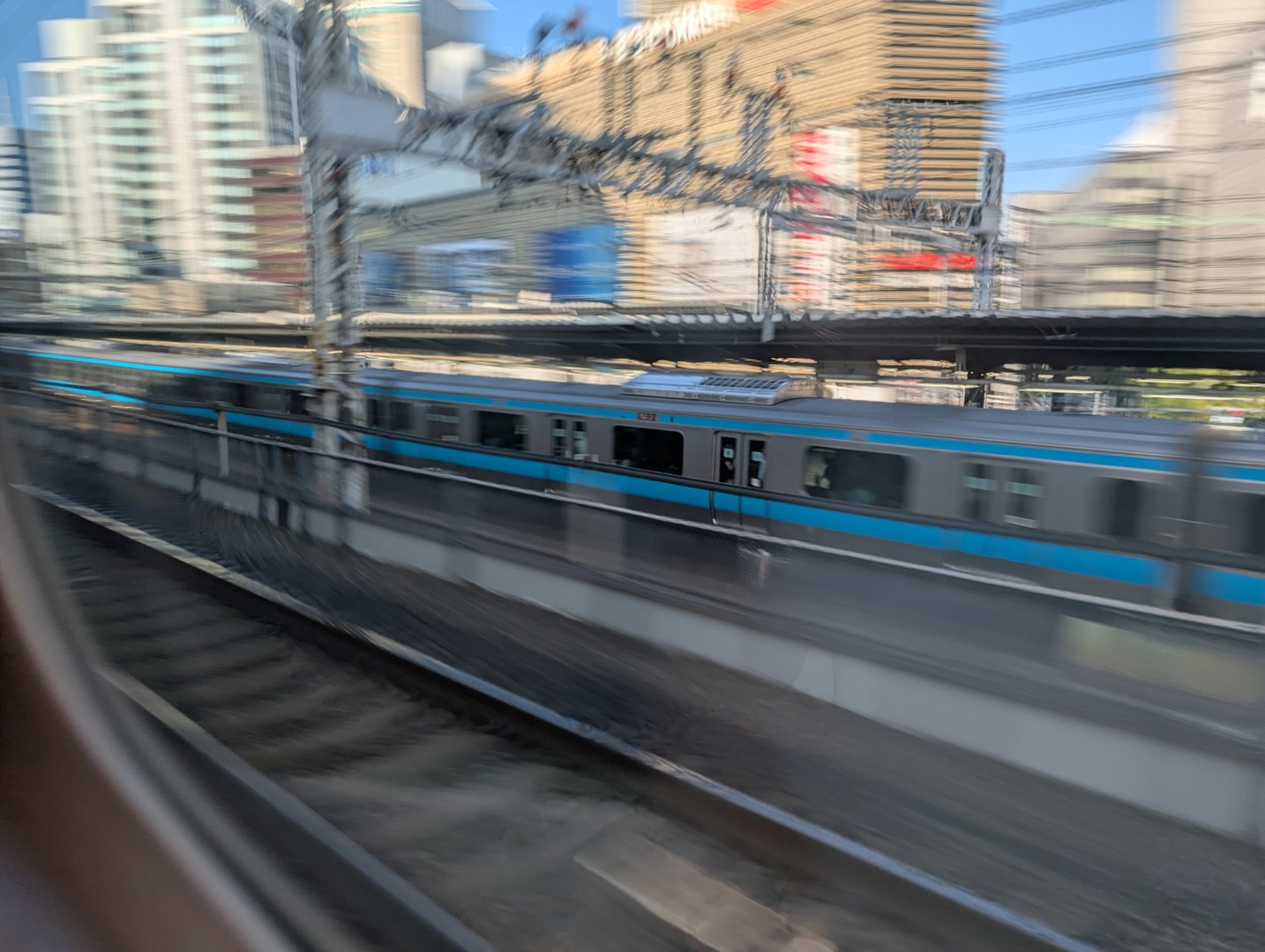 chuck caught this motion-blurred shot of the yamanote line train passing through chiyoda during morning rush hour. tokyo's rail system is INTENSE.