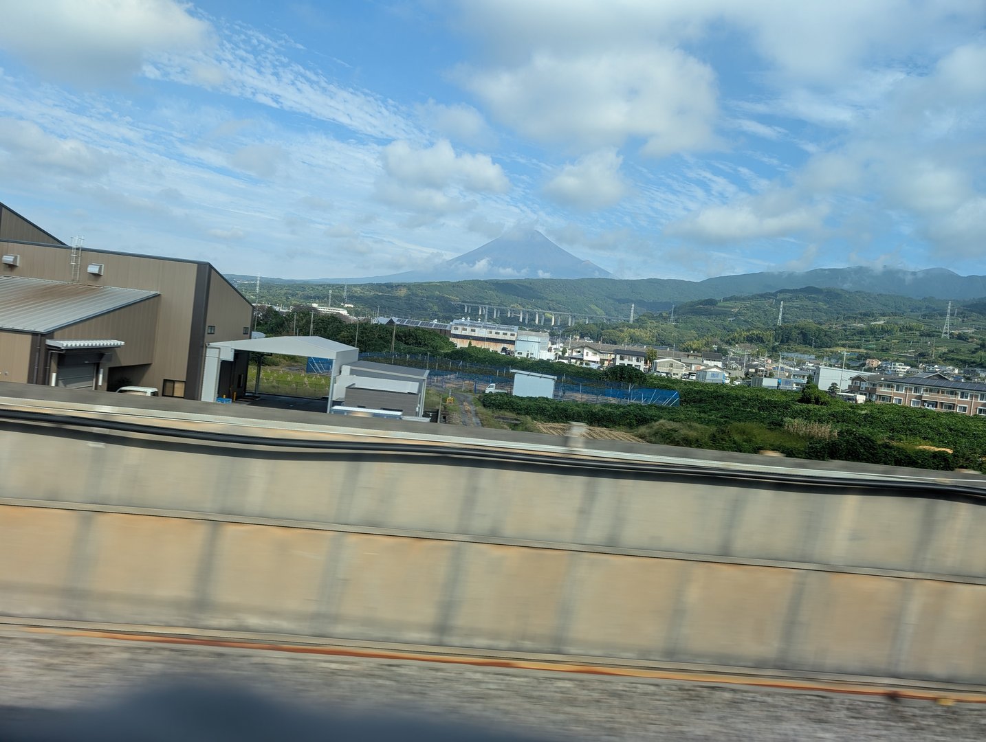 quick snap of mount FUJI from the shinkansen window while zooming between tokyo and osaka. chuck managed to catch it through the blur of speed.