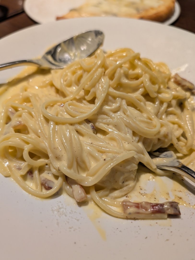 chuck found this AMAZING carbonara at a tiny italian spot in osaka - who knew japan did italian this well