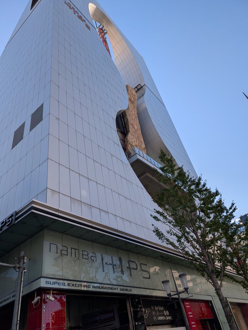 early morning shot of the WILD architecture at namba parks mall in osaka. chuck managed to capture that weird rock wall thing jutting out of the building.