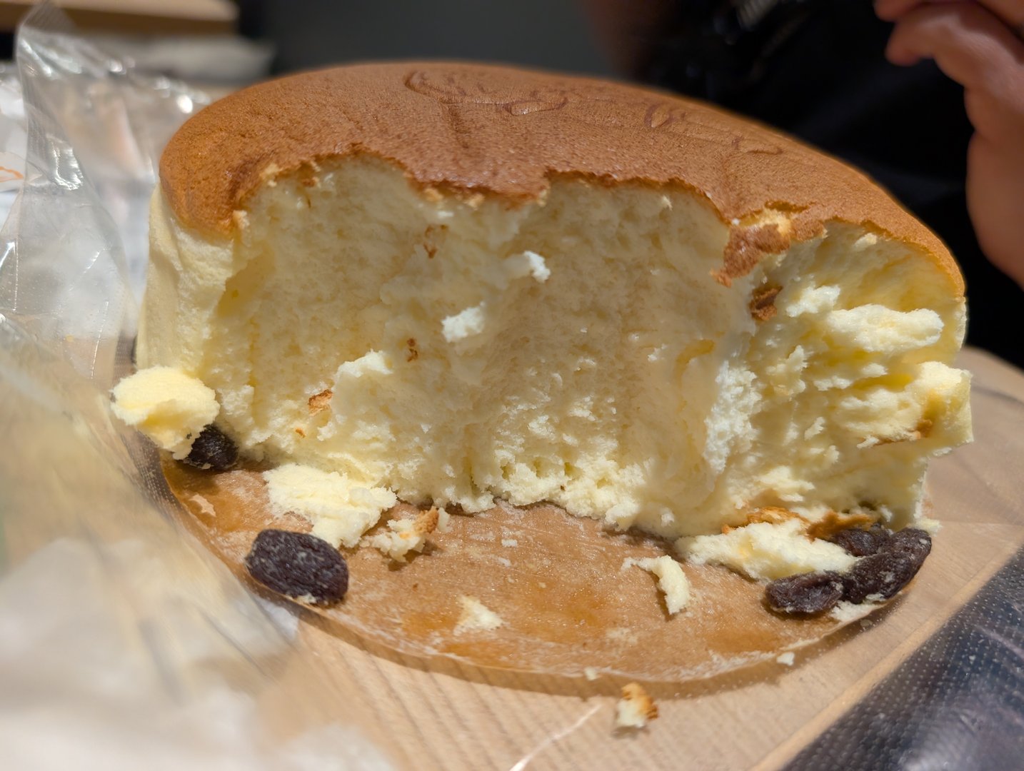 chuck's close-up of a half-eaten japanese cheesecake from osaka's famous namba district - way FLUFFIER than anything back home