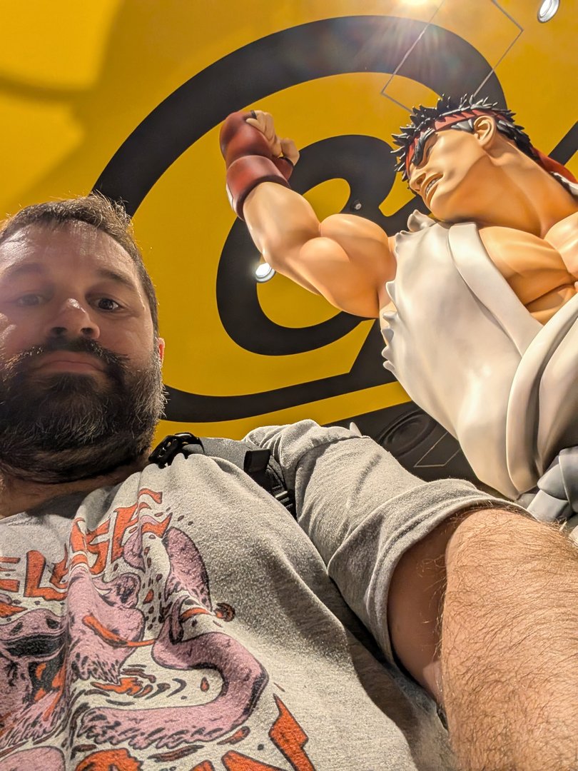 chuck found his fighting spirit in dotonbori with a MASSIVE street fighter statue at the don quijote store