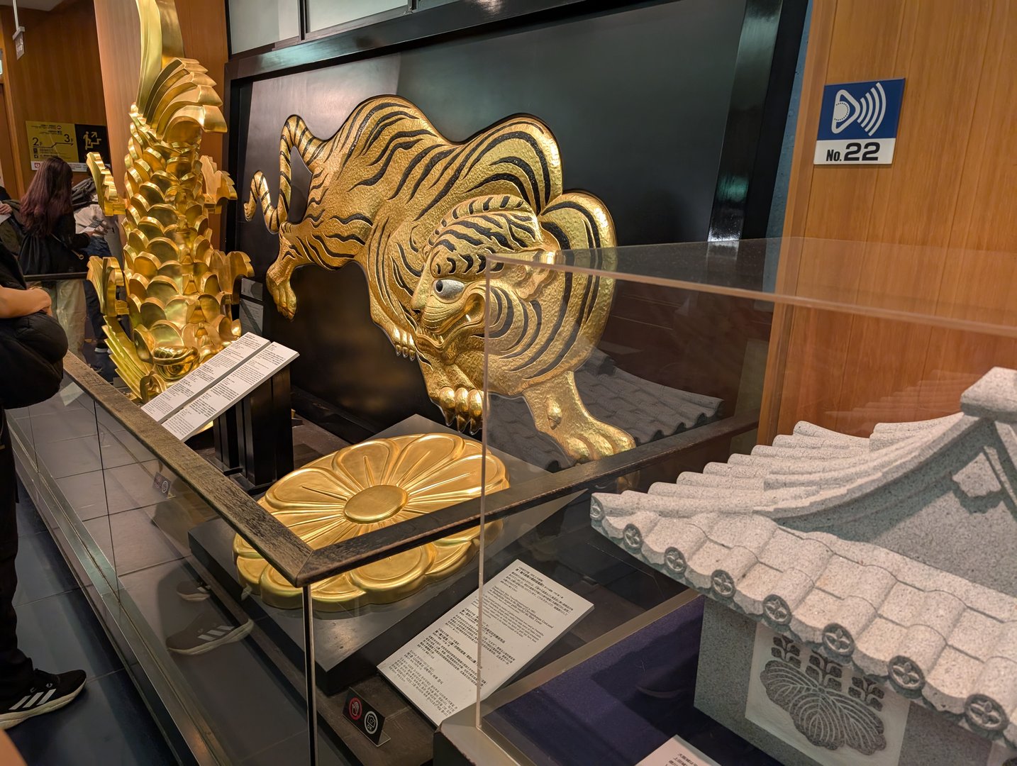 checking out the original gold shachihoko from osaka castle's roof - these tiger-fish sculptures are WAY more impressive up close than when you're squinting at them from the ground