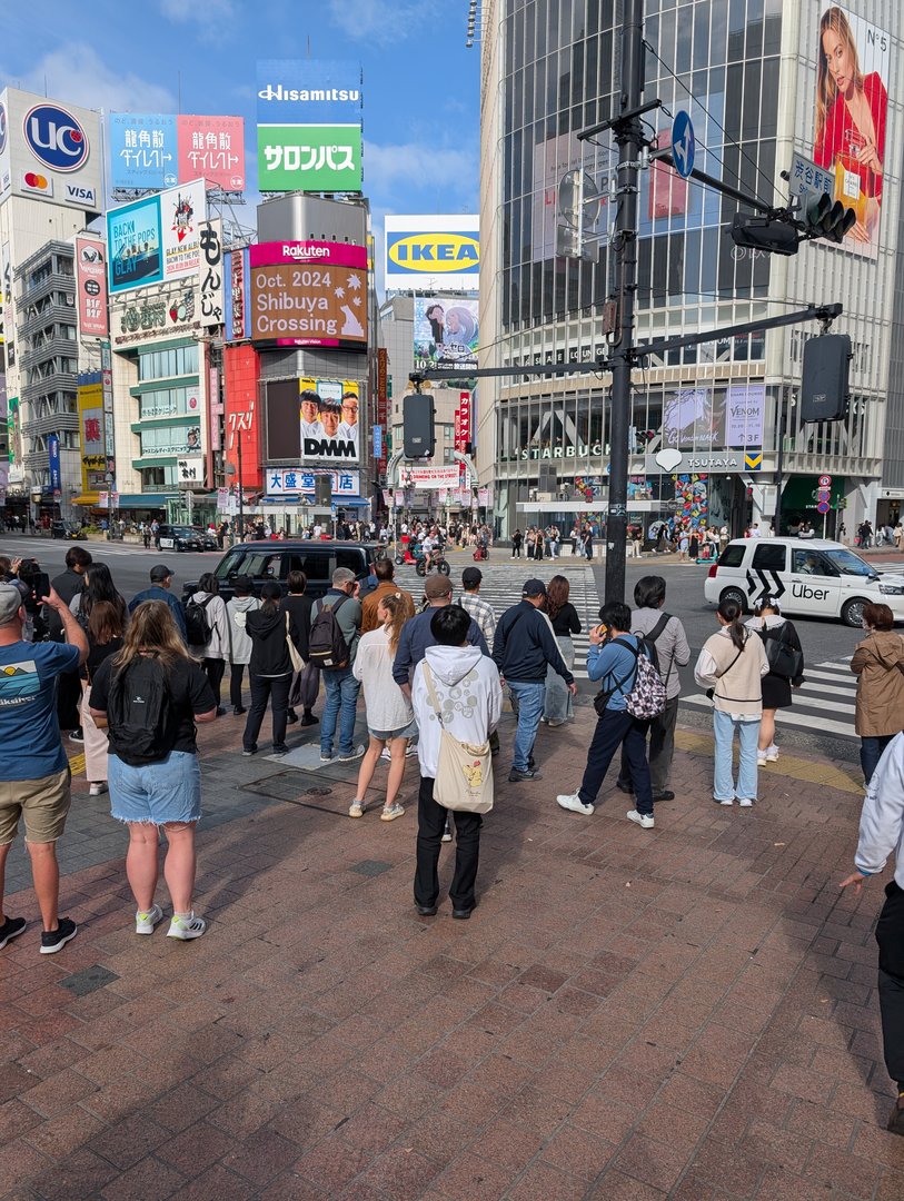 waiting with the crowd at the FAMOUS shibuya crossing - chuck managed to snap this while ashley was trying to figure out which direction to head next