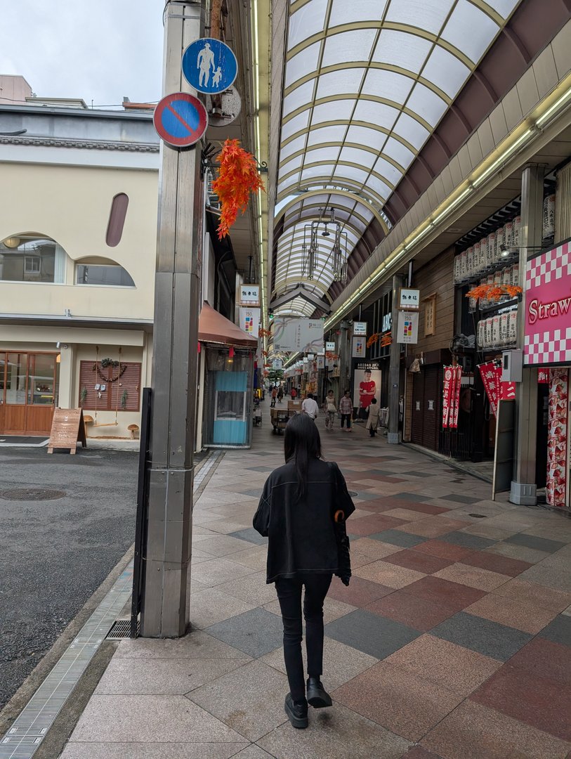 ashley exploring the covered shopping arcade near kyoto station on a quiet monday morning. these traditional shotengai are EVERYWHERE in japan.