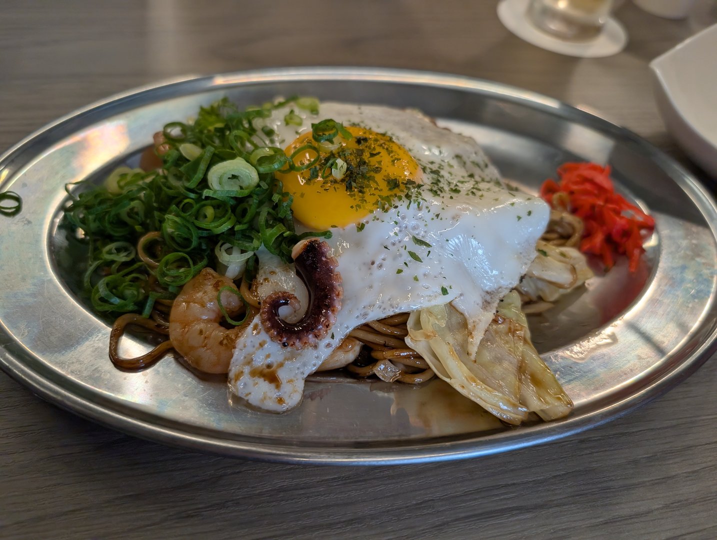 lunch near nishiki market - this seafood yakisoba with a perfect runny egg might be the best thing i've eaten in kyoto so far