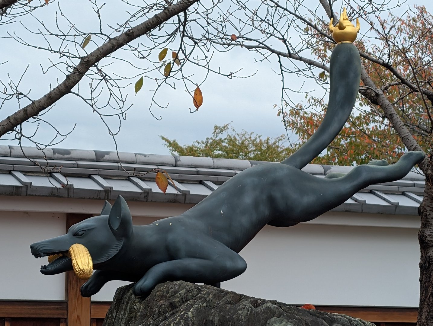 chuck found this WILD fox statue near fushimi inari shrine - apparently it's a guardian spirit called kitsune that loves snacking on fried tofu