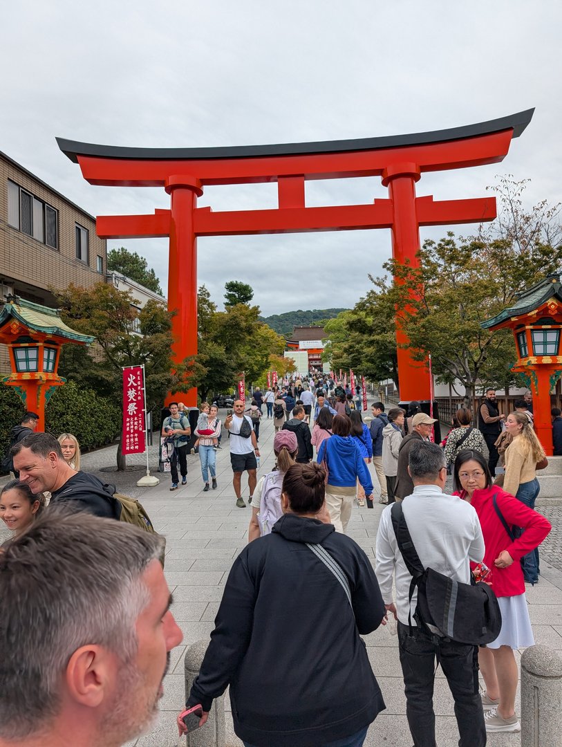 chuck caught this shot of the MASSIVE crowds heading into fushimi inari shrine on a tuesday morning. turns out everyone wants to see those famous orange gates.