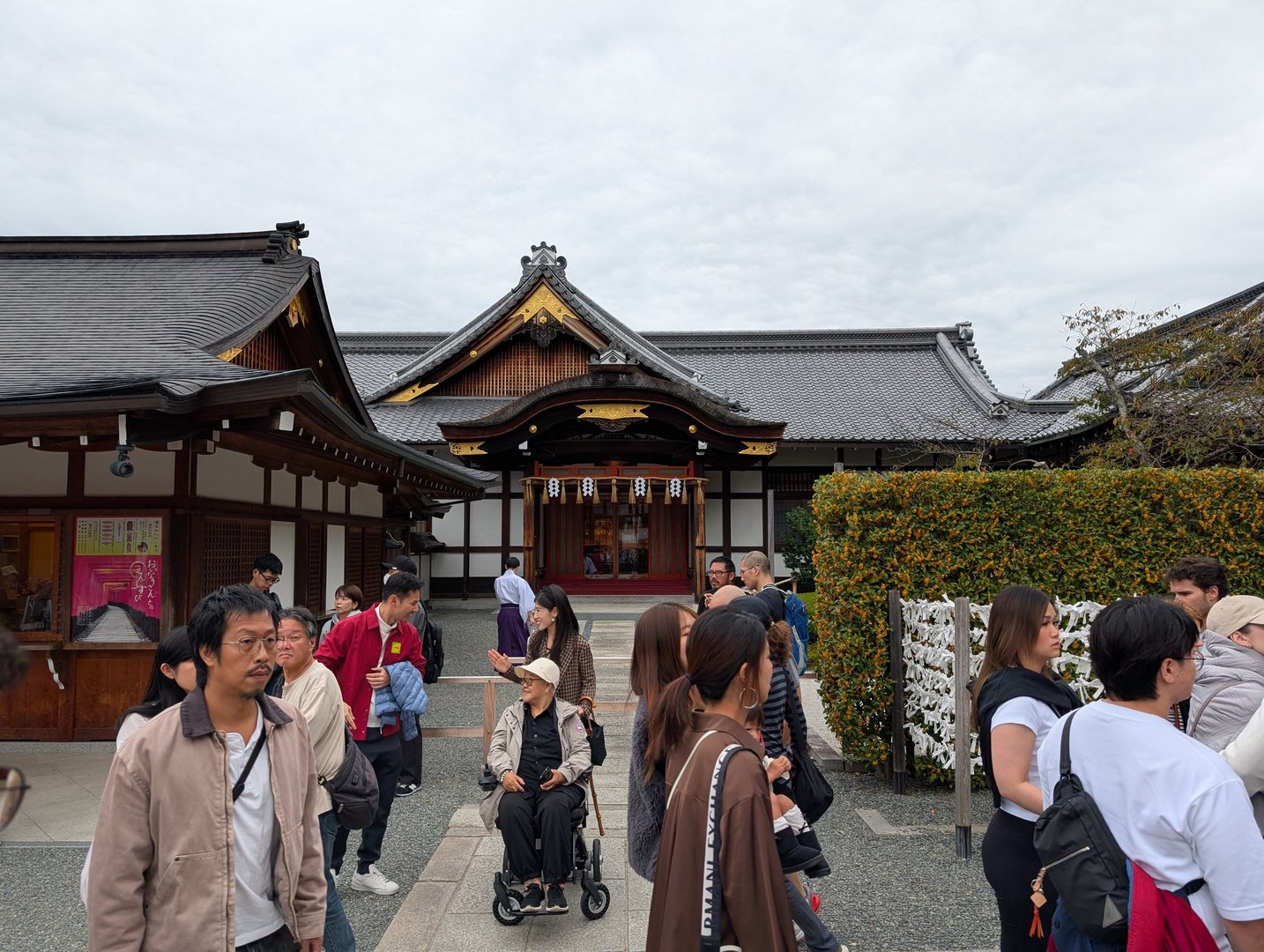 typical morning crowd at fushimi inari shrine - chuck managed to get this shot of the smaller buildings near the entrance before we tackled those ENDLESS orange gates