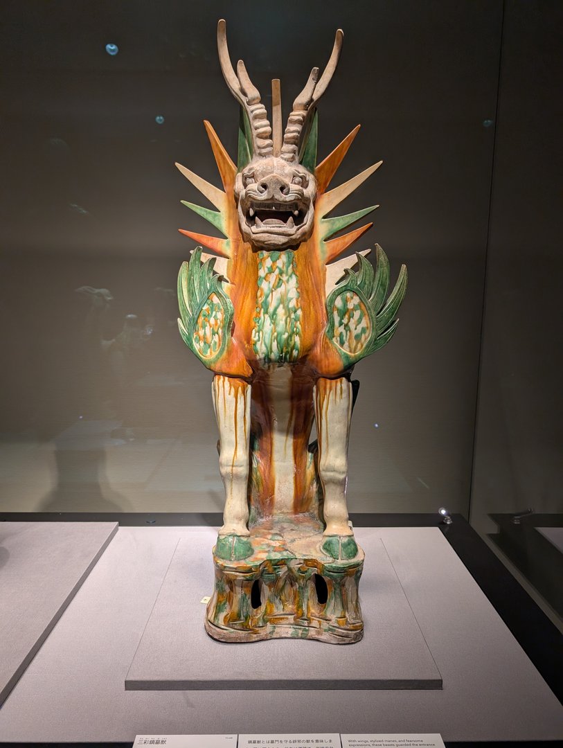 stunning tang dynasty-style ceramic guardian at the tokyo national museum - chuck managed to catch this WILD three-color glazed beast between tour groups