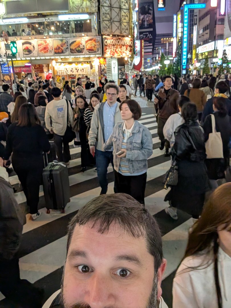 chuck's selfie in the CHAOS of shinjuku's kabukicho district, where the neon signs and okonomiyaki spots are giving off major blade runner vibes