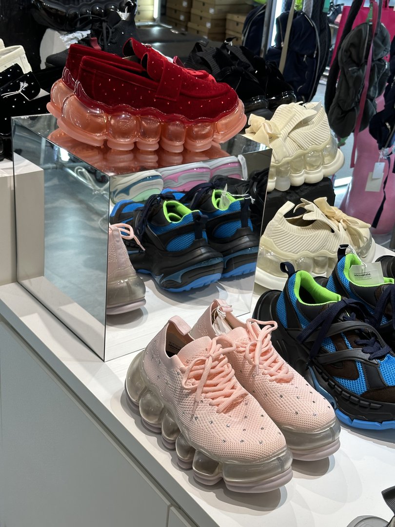 checking out some WILD chunky sneakers at a boutique in shibuya - these japanese streetwear shops hit different