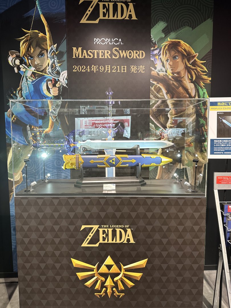 dan found this EPIC zelda master sword display while exploring akihabara's gaming shops - christina's already planning where it'll go in their game room